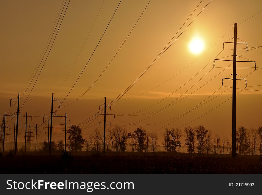 Photo of electric wires against a grass. Photo of electric wires against a grass