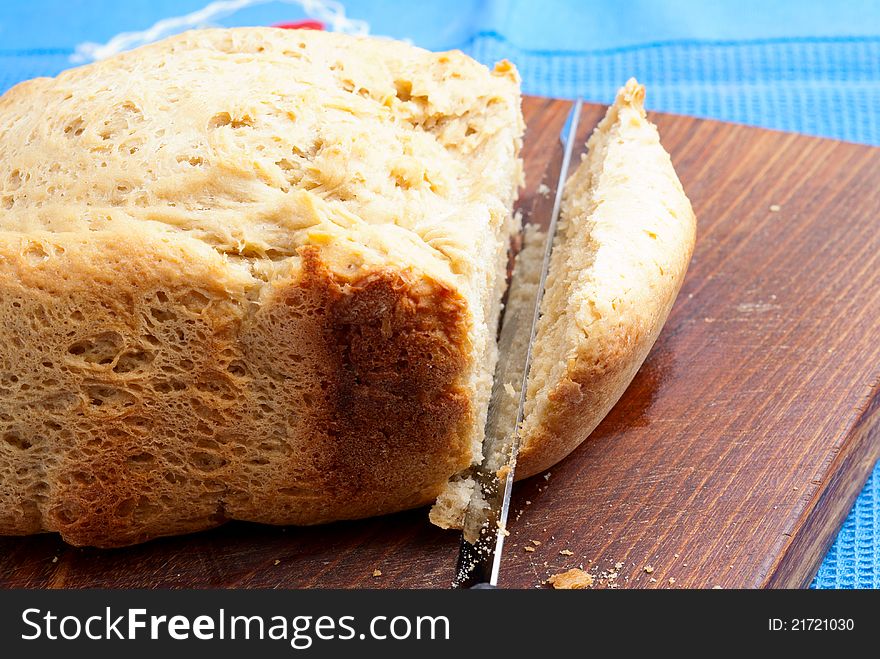 Home made bread and knife over the table