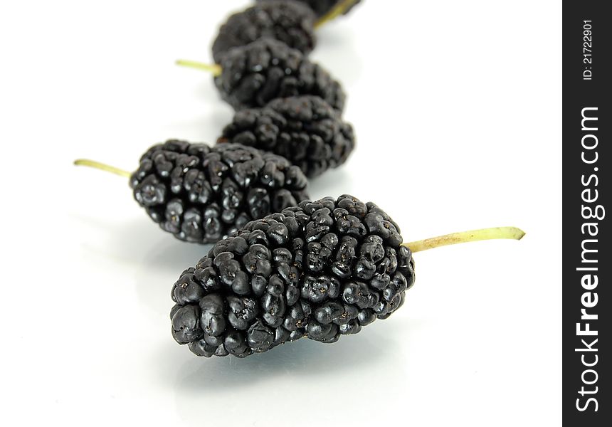 Black Mulberries Isolated On White Background