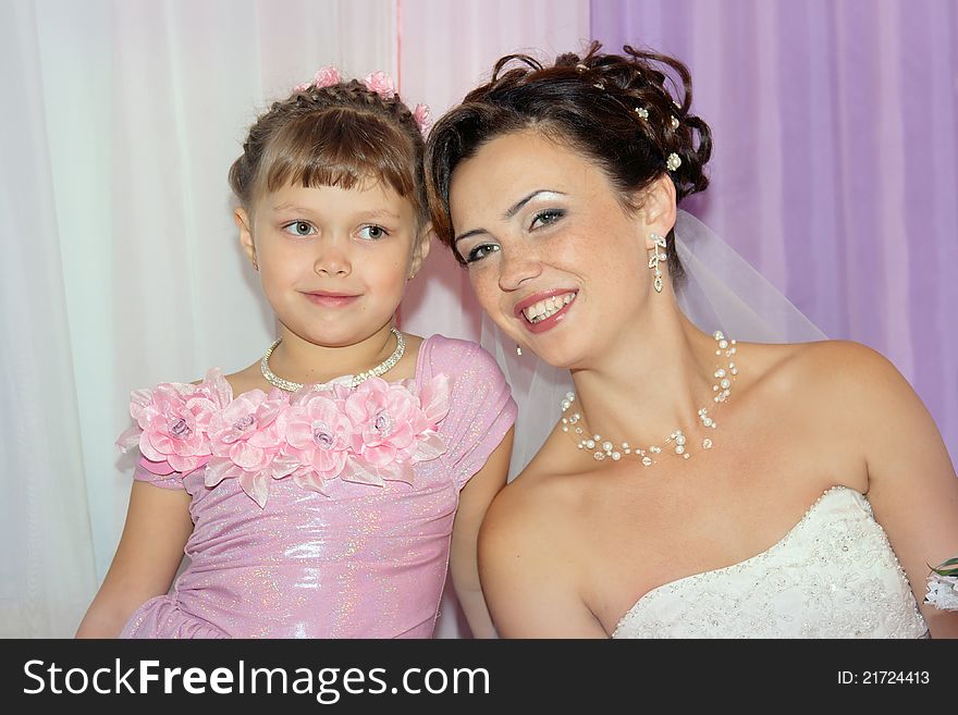 Happy Bride With Flower Girl