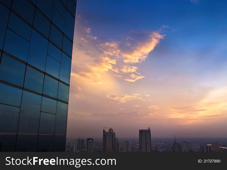 Top View Building And Reflection At Sunset Time