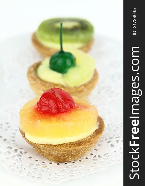 Creamy dessert tarts with fruits