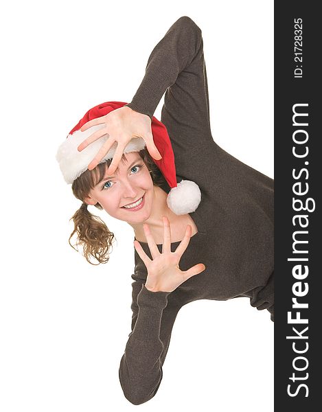 Young girl in Santa hat gesturing