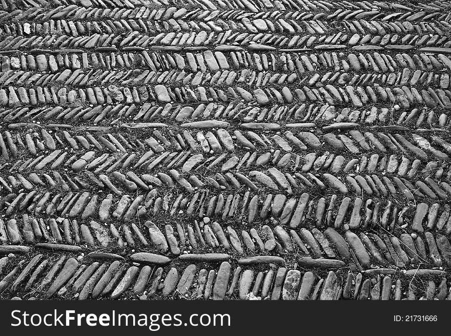 Historic ancient Pavement created out of Pebble stones arranged in several Rows, Castle