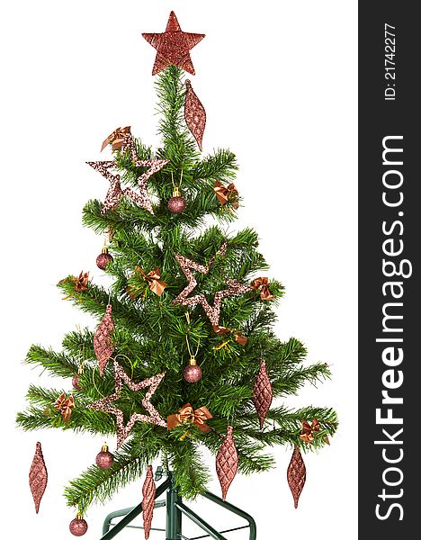 Beautifully decorated christmas tree with brown decoration over white. Traditional christmas concept. Beautifully decorated christmas tree with brown decoration over white. Traditional christmas concept.
