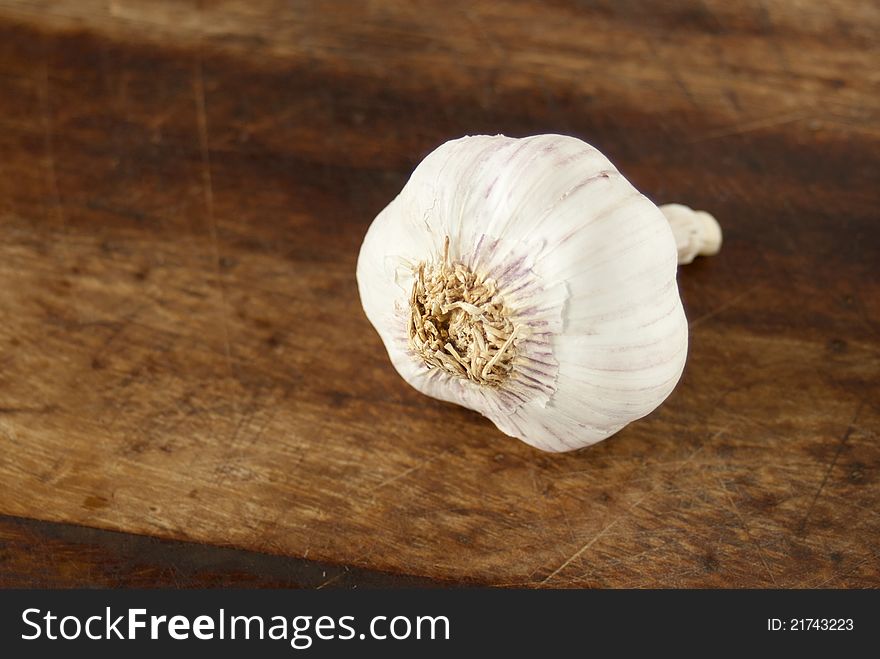 Garlic On Wood Background