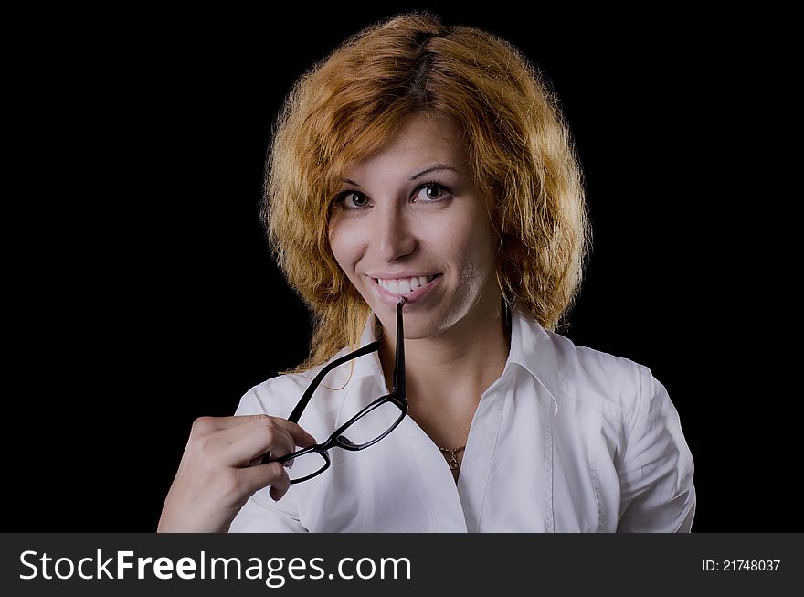 Portrait of smiling young girl isolated on black. Portrait of smiling young girl isolated on black