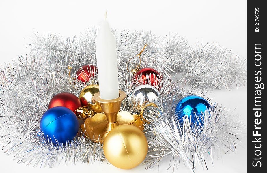 Christmas and New Year decoration- balls and candle .On white background