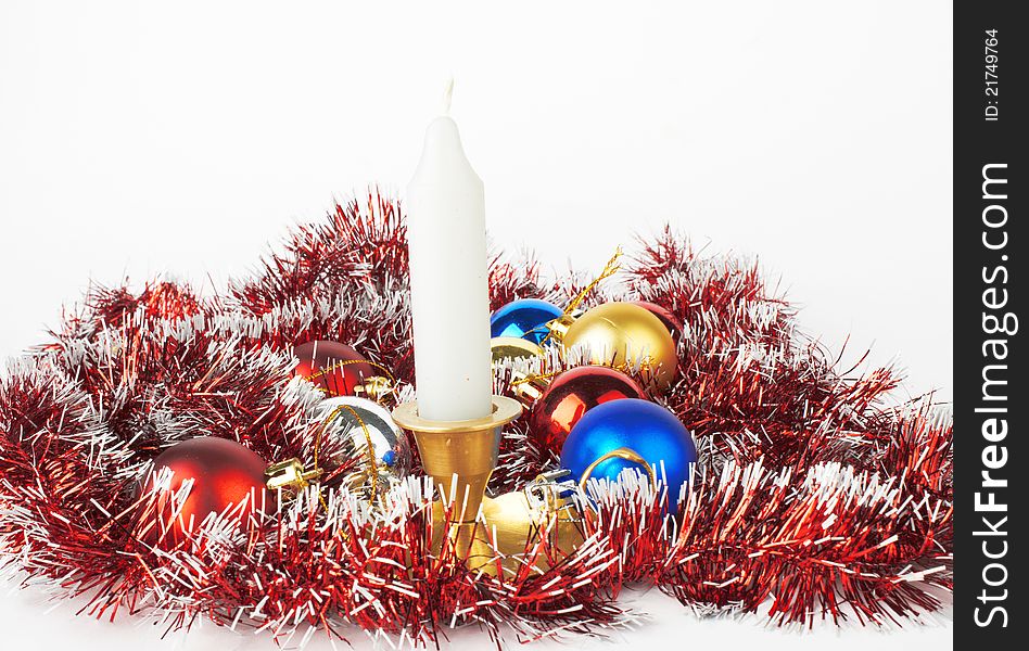 Christmas and New Year decoration- balls and candle .On white background