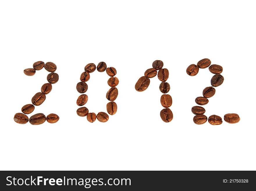 Coffee with granules and new year 2012 on a white background.