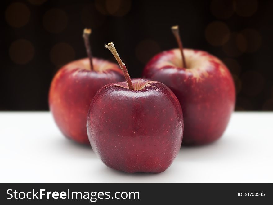 Three red heirloom apples with black and white background. Three red heirloom apples with black and white background