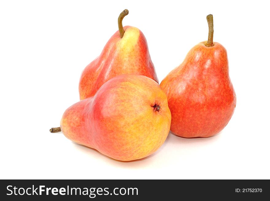 Fresh red pears on a white background, close up. Fresh red pears on a white background, close up