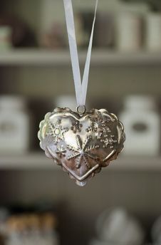 White Ribbon With A Iron Heart With Stars Stock Photos White Ribbon With A Iron Heart With Stars Stock Photos
