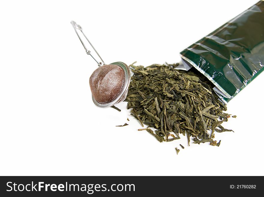 Leaves Of Green Tea With Strainer