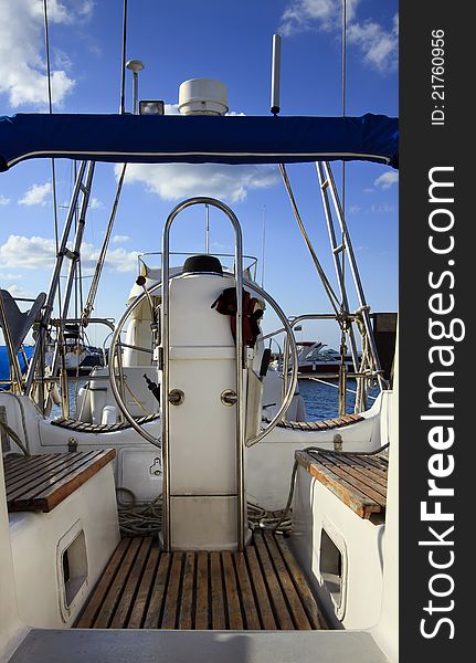 Moored yacht in a marina showing location of crew and passengers. Moored yacht in a marina showing location of crew and passengers.