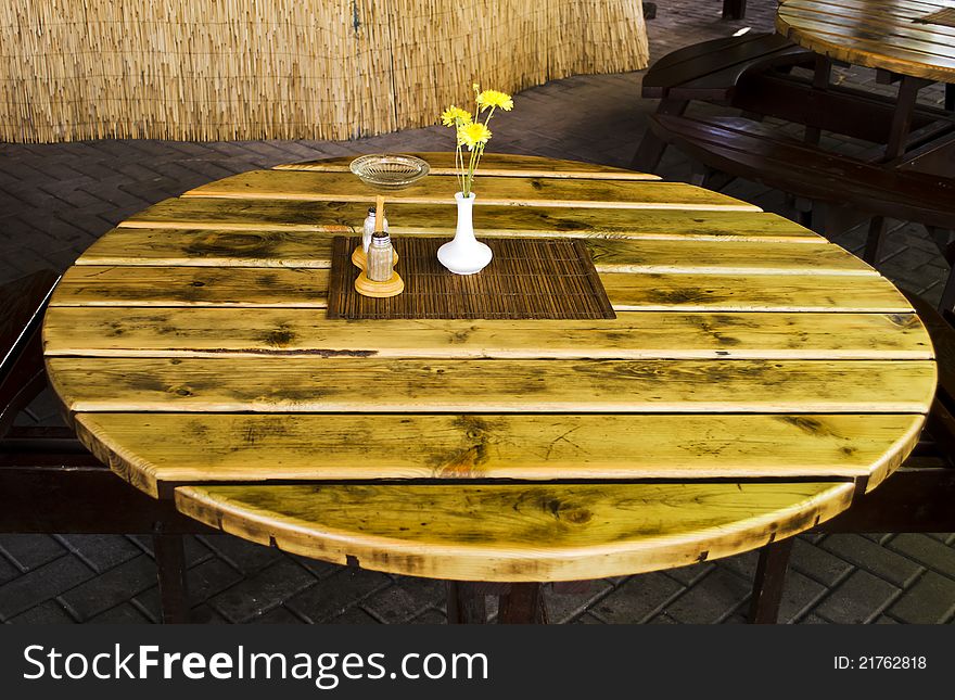 Old Style Table Served With Flowers