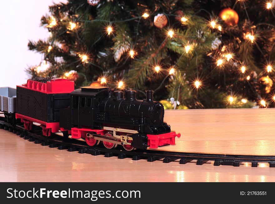 Train toy with christmas tree . Train toy with christmas tree .
