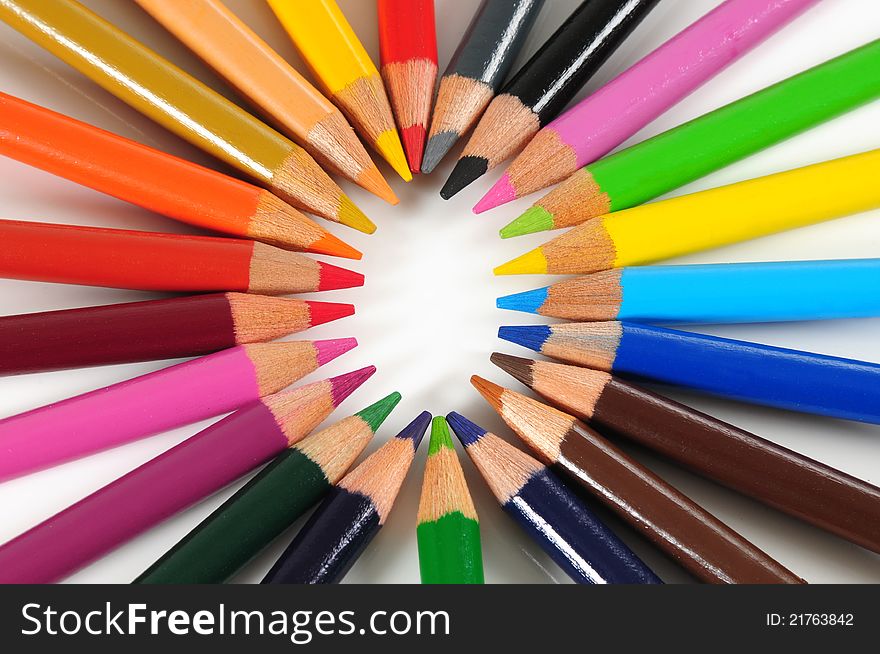 Arranged color pencils in a circle. Arranged color pencils in a circle.