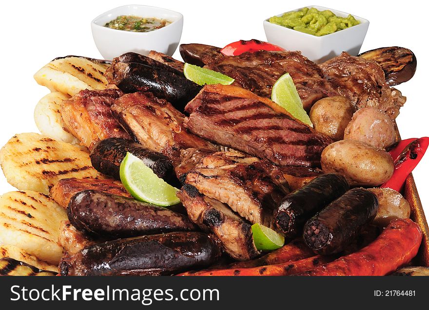 Barbecued variety of meats, beef, pork and chicken. Barbecued variety of meats, beef, pork and chicken.