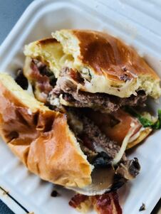 Messy Mushroom, Swiss Bacon Burger On A Roll Stock Photos