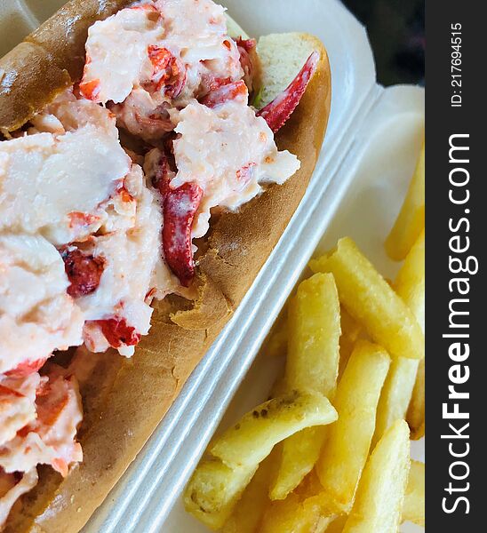 A new england favorite, Maine lobster rolls, juicy meat, with a little mayo on a toasted hot dog bun, and gotta have the side of french fries, and washed down with a coca cola or a an iced cold beer. A new england favorite, Maine lobster rolls, juicy meat, with a little mayo on a toasted hot dog bun, and gotta have the side of french fries, and washed down with a coca cola or a an iced cold beer.