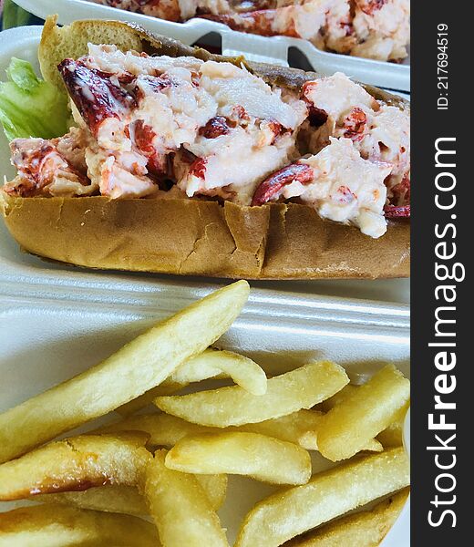 A new england favorite, Maine lobster rolls, juicy meat, with a little mayo on a toasted hot dog bun, and gotta have the side of french fries, and washed down with a coca cola or a an iced cold beer. A new england favorite, Maine lobster rolls, juicy meat, with a little mayo on a toasted hot dog bun, and gotta have the side of french fries, and washed down with a coca cola or a an iced cold beer.