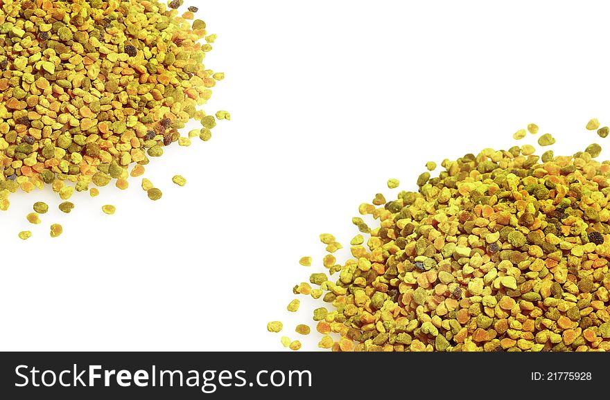 Bee pollen grains isolated on white background. Pollen granules close up.