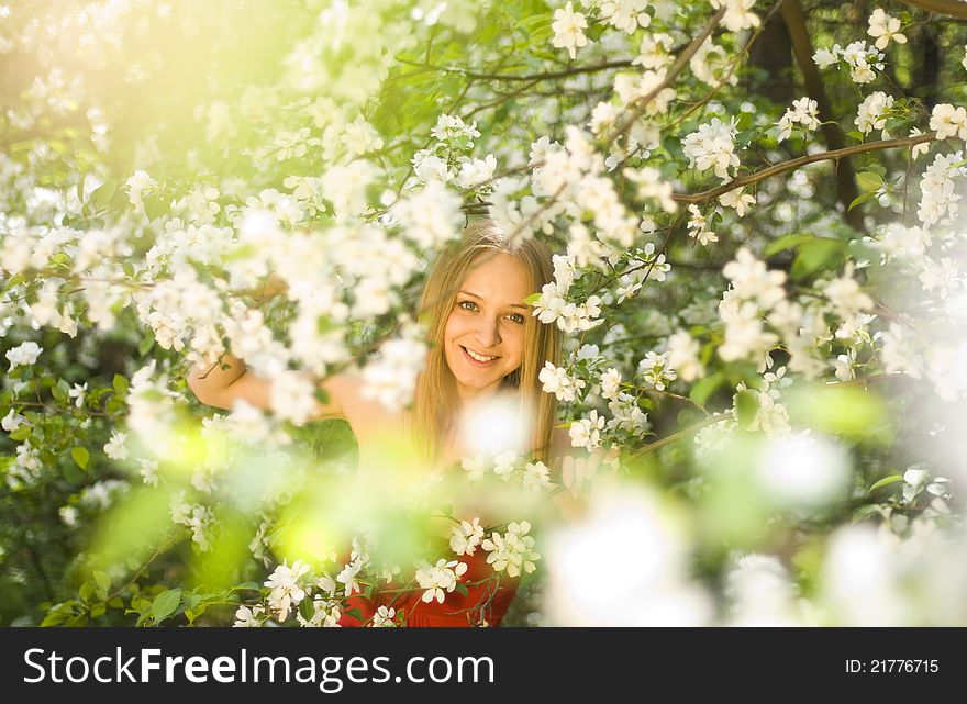 Beautiful blond girl with apple-tree. Beautiful blond girl with apple-tree