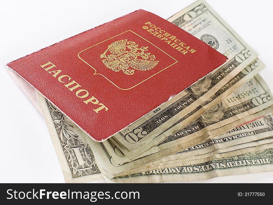 Russian international traveling passport and money over white background. Not . Russian international traveling passport and money over white background. Not .