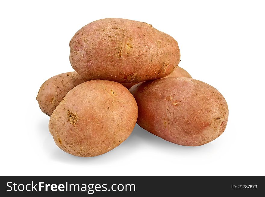 A small pile of potatoes pink with a light shade on white background. A small pile of potatoes pink with a light shade on white background