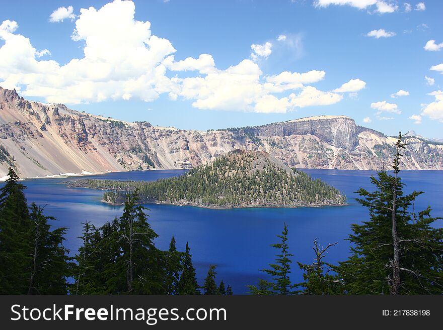 Crater Lake, located in central Oregon on a warm afternoon with a cool breeze. Crater Lake, located in central Oregon on a warm afternoon with a cool breeze.