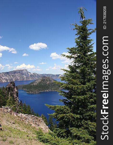 Crater Lake, located in central Oregon on a warm afternoon with a cool breeze. Crater Lake, located in central Oregon on a warm afternoon with a cool breeze.