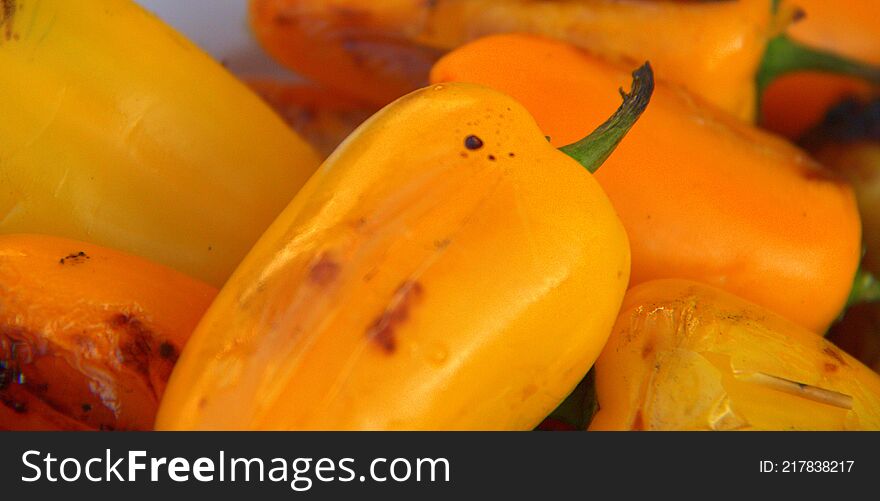 Peppers Cooking On The Grille On As Summer Day