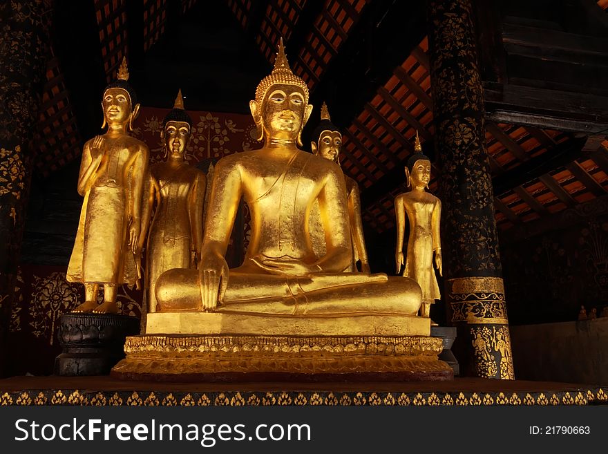 Golden Buddha statue in temple at Lampang province, Thailand