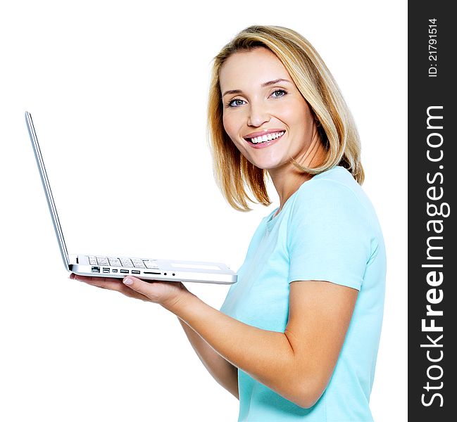 Happy young woman with laptop on white bacground