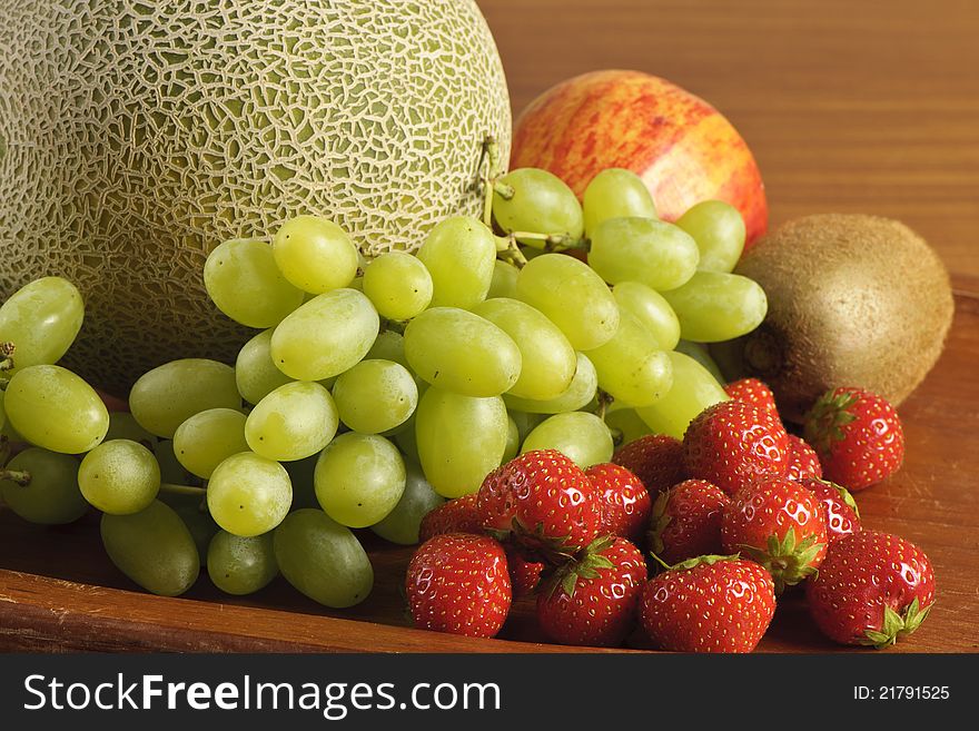 Melon, grape, strawberry, apple and kiwi