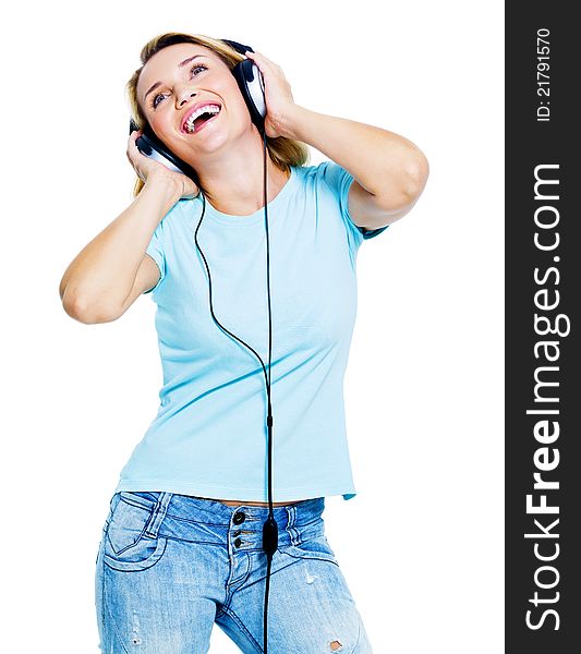 Happy woman with headphones looking up - isolated on white background