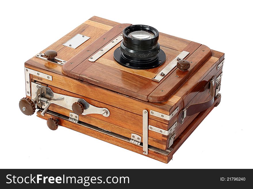 Old vintage photo camera isolated on white