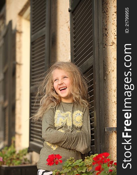 Girl posing by the window