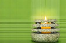Stone Candle On Green Royalty Free Stock Image