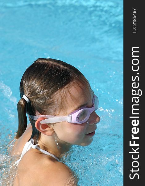 Girl swimming in the pool