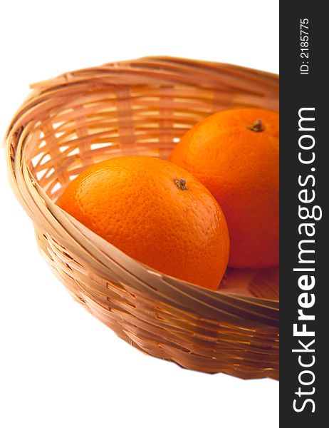 Two tangerine in a wum plate on a white background