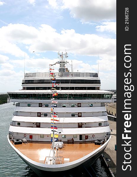 Modern cruise ship anchored at a dock. Modern cruise ship anchored at a dock