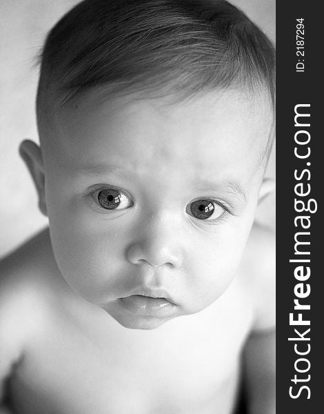 Black and white image of beautiful 10 month old baby boy. Black and white image of beautiful 10 month old baby boy