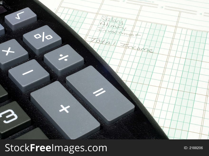 This is an image of a calculator on ledger paper. This is an image of a calculator on ledger paper.