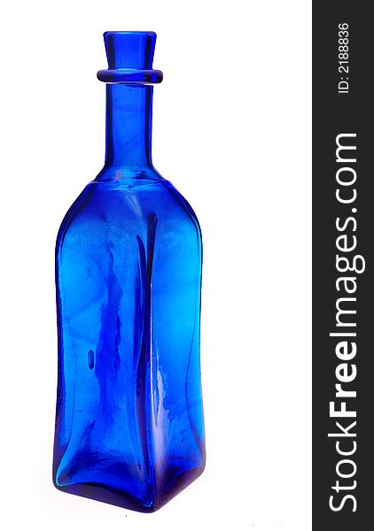 Cobalt blue colored medicine bottle - antique on white background