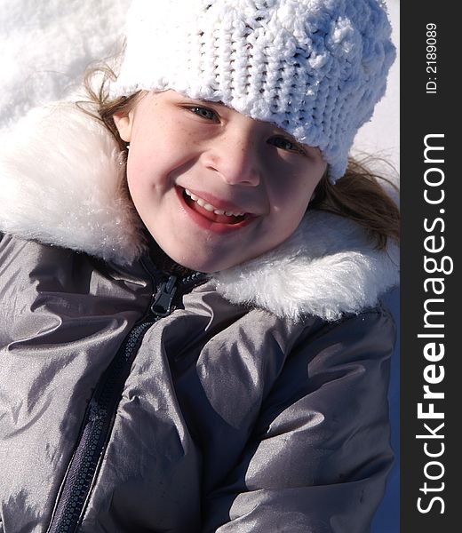 Adorable girl with winter hat and coat. Adorable girl with winter hat and coat