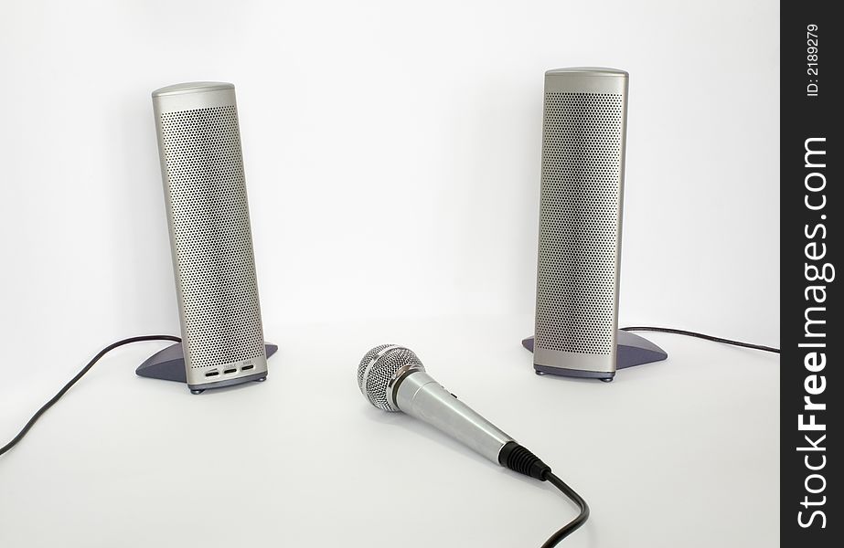 Two computer speakers and microphone