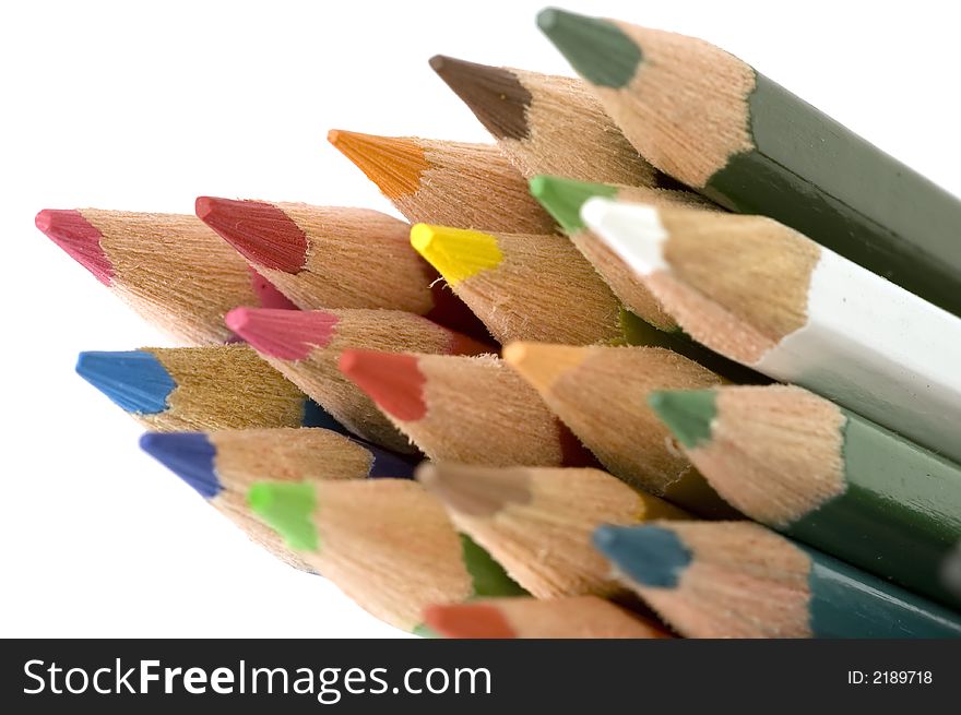 Group of colored pencils isolated diagonally on a white background. Group of colored pencils isolated diagonally on a white background