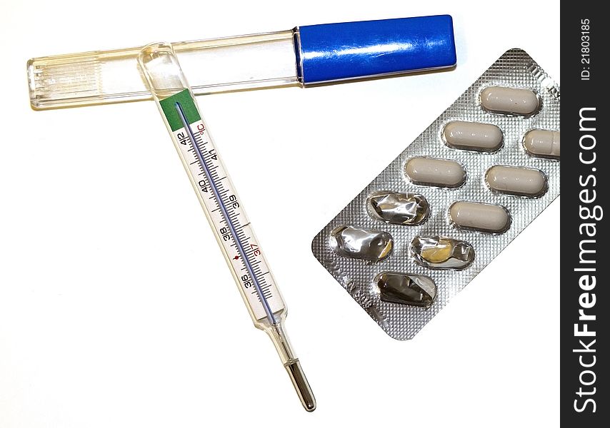 Thermomether and pills for curing fever,  with white background. Thermomether and pills for curing fever,  with white background.
